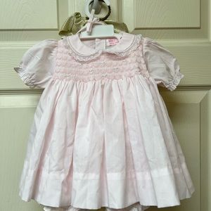 Worn once. Good as new. Light pink dress for newborn.